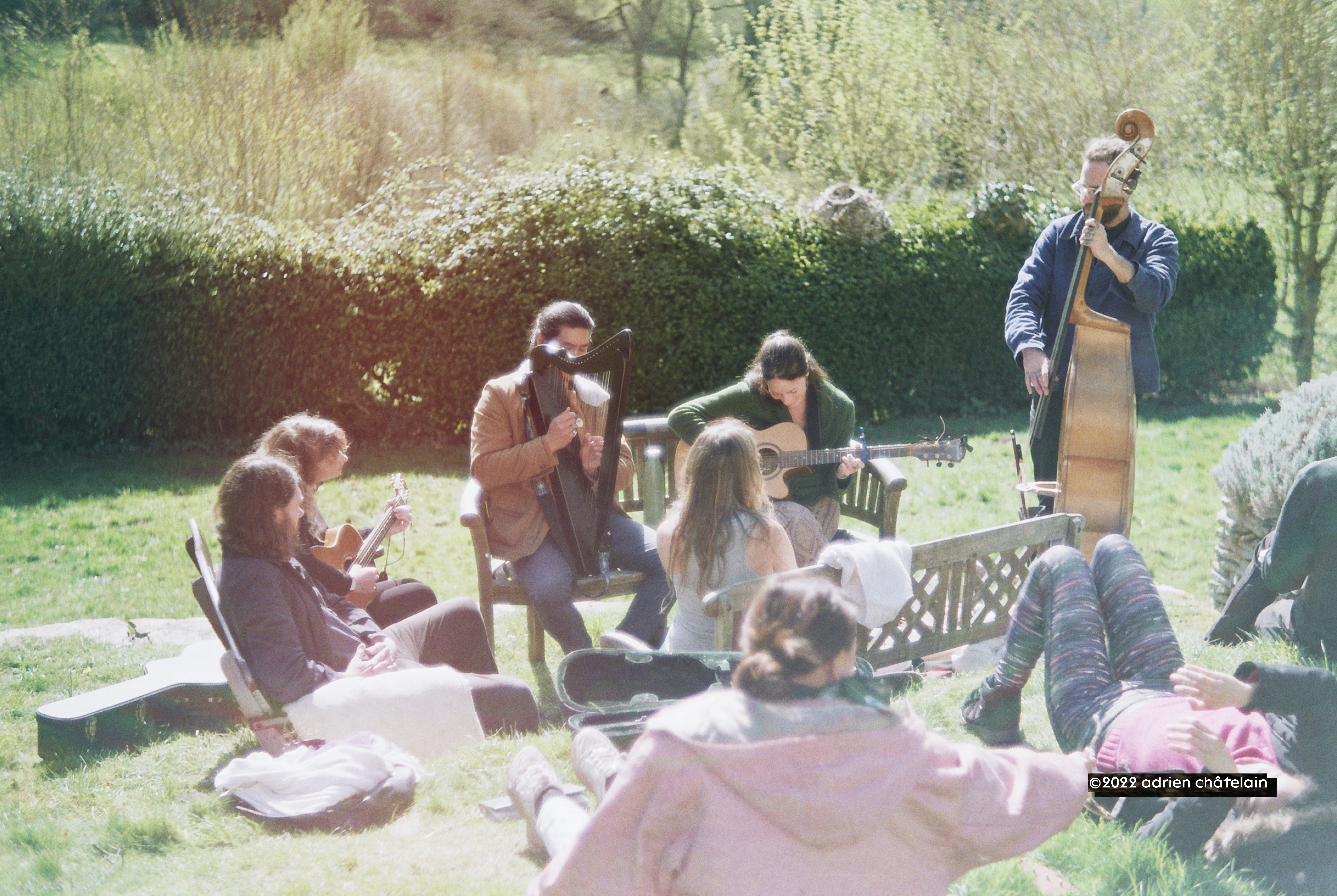 Talented musicians improvise with acoustic instruments in the sunnny gardens of Hawkwood